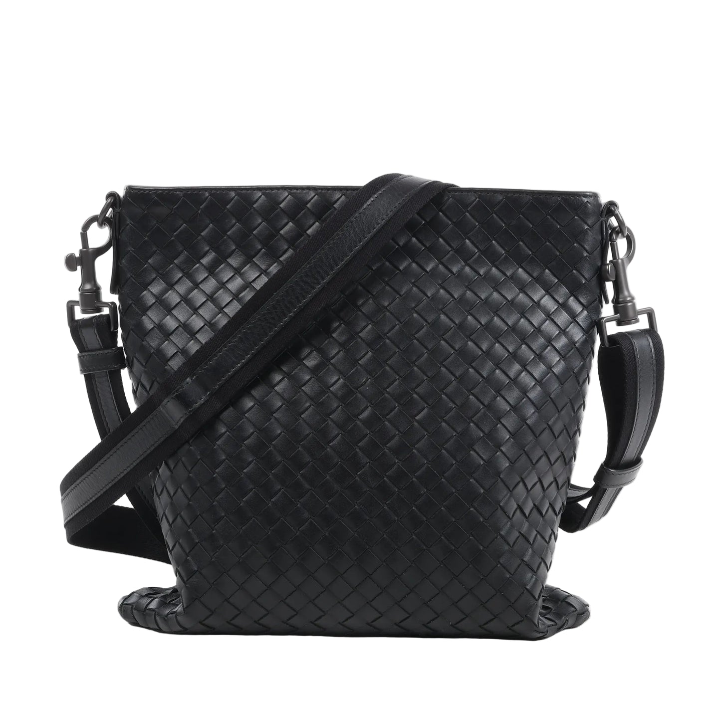 Bottega Veneta VN Intrecciato crossbody messenger bag in black woven leather with adjustable shoulder strap, rectangular shape, and minimalist design against a white background.