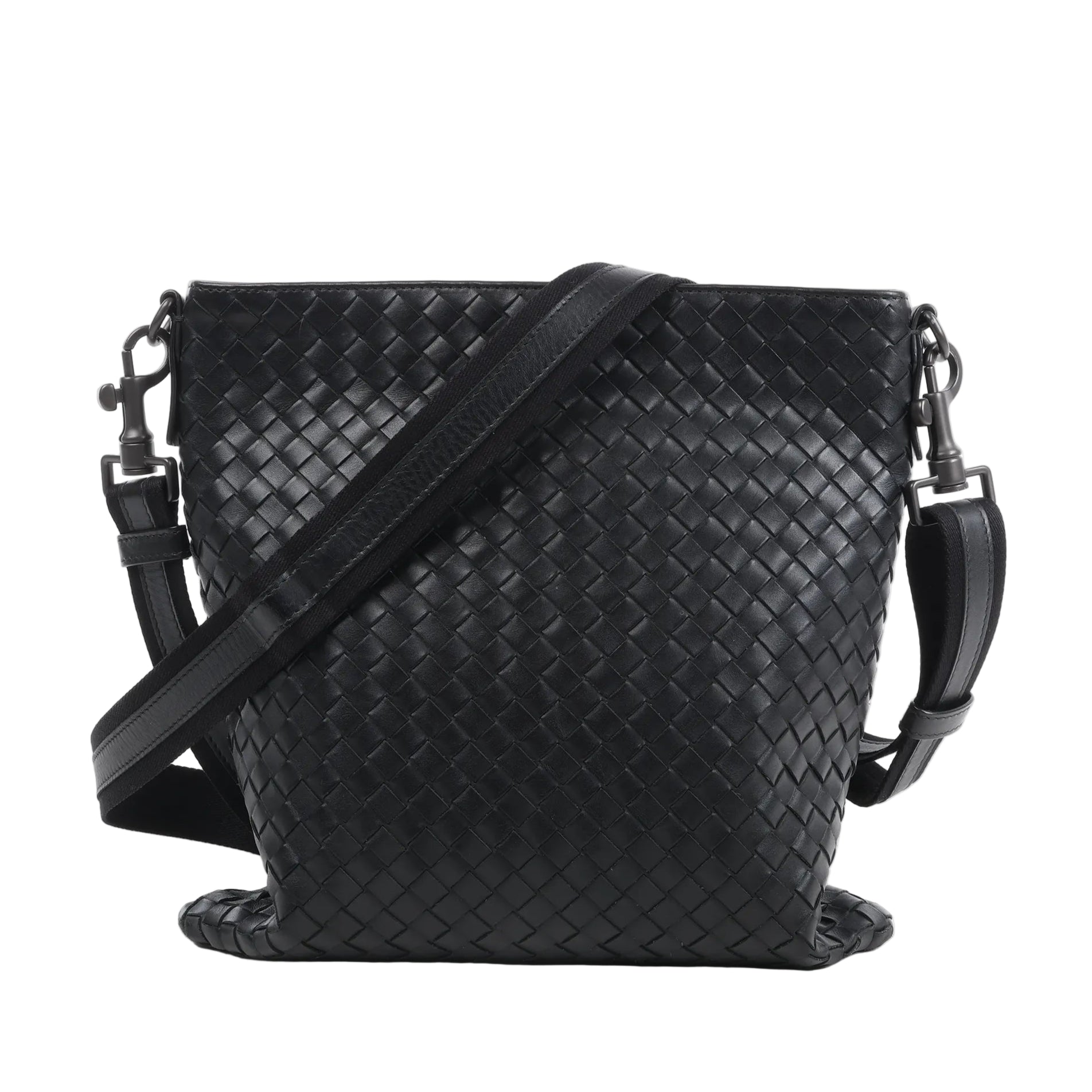 Bottega Veneta VN Intrecciato crossbody messenger bag in black woven leather with adjustable shoulder strap, rectangular shape, and minimalist design against a white background.