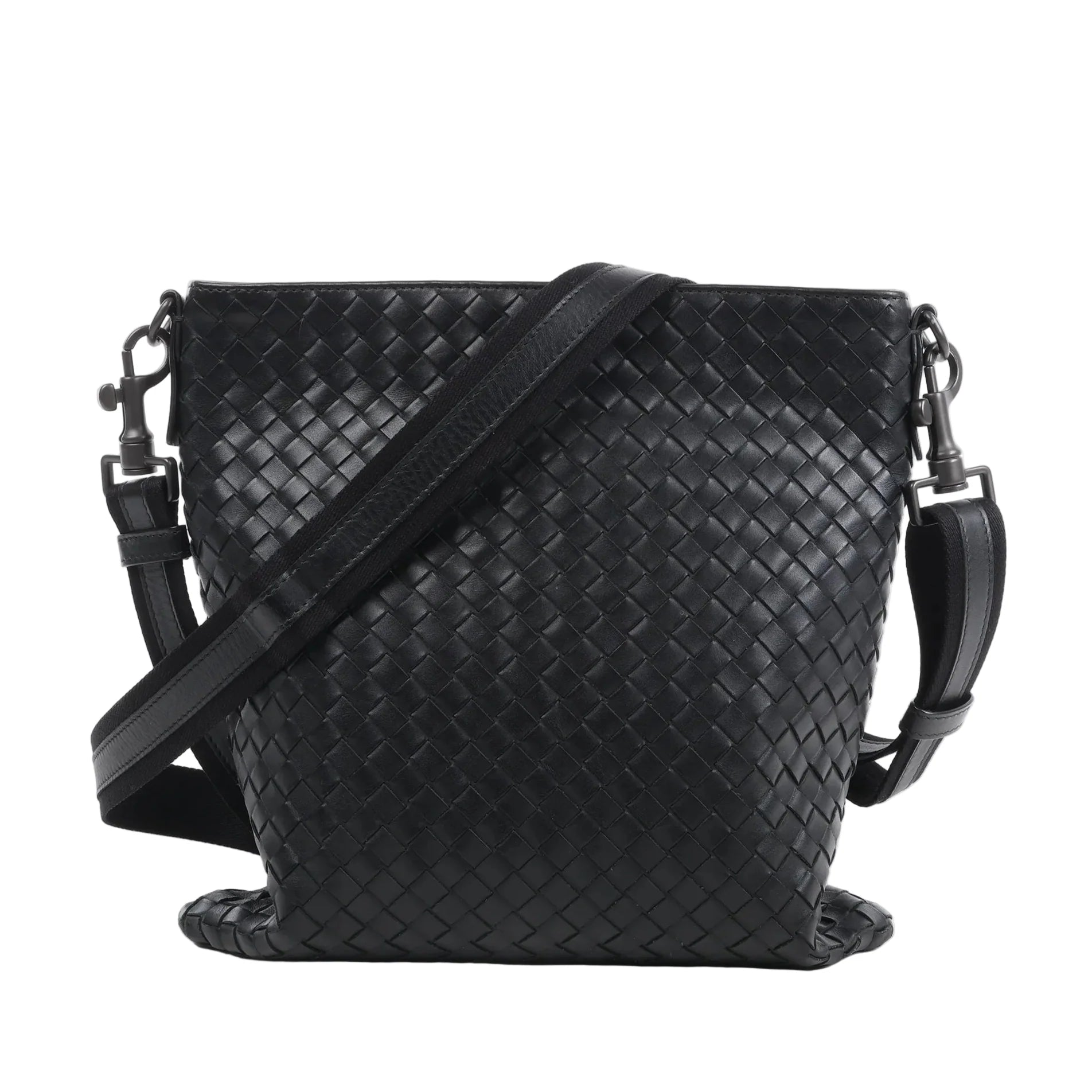Bottega Veneta VN Intrecciato crossbody messenger bag in black woven leather with adjustable shoulder strap, rectangular shape, and minimalist design against a white background.