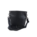 Bottega Veneta Intrecciato crossbody messenger bag in black woven leather with an adjustable shoulder strap, black hardware and bucket-style silhouette on a white background.
