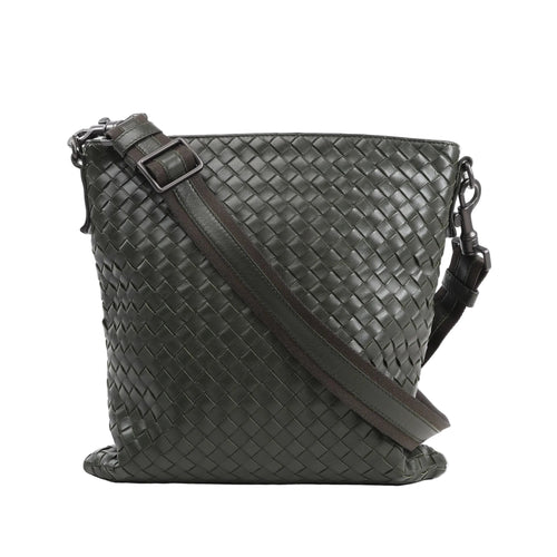 Bottega Veneta Nappa Intrecciato VN Crossbody Messenger Bag in green woven leather with an adjustable leather and fabric shoulder strap and gunmetal-tone hardware, displayed upright against a white background.