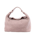 Pink Bottega Veneta Intrecciato woven leather shoulder bag with a woven handle and softly structured rounded silhouette.