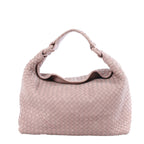 Pink Bottega Veneta Intrecciato woven leather shoulder bag with a woven handle and softly structured rounded silhouette.