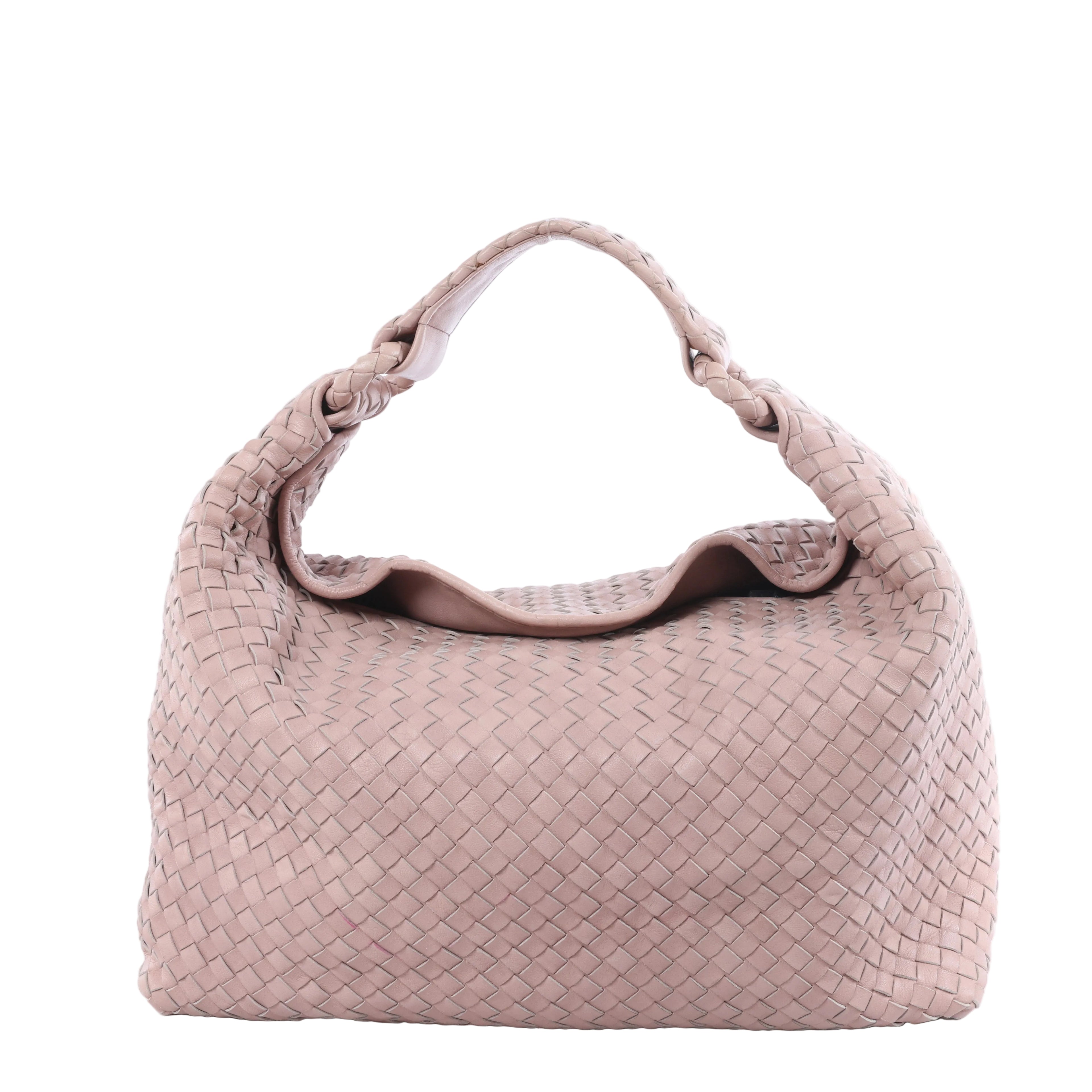 Pink Bottega Veneta Intrecciato woven leather shoulder bag with a woven handle and softly structured rounded silhouette.