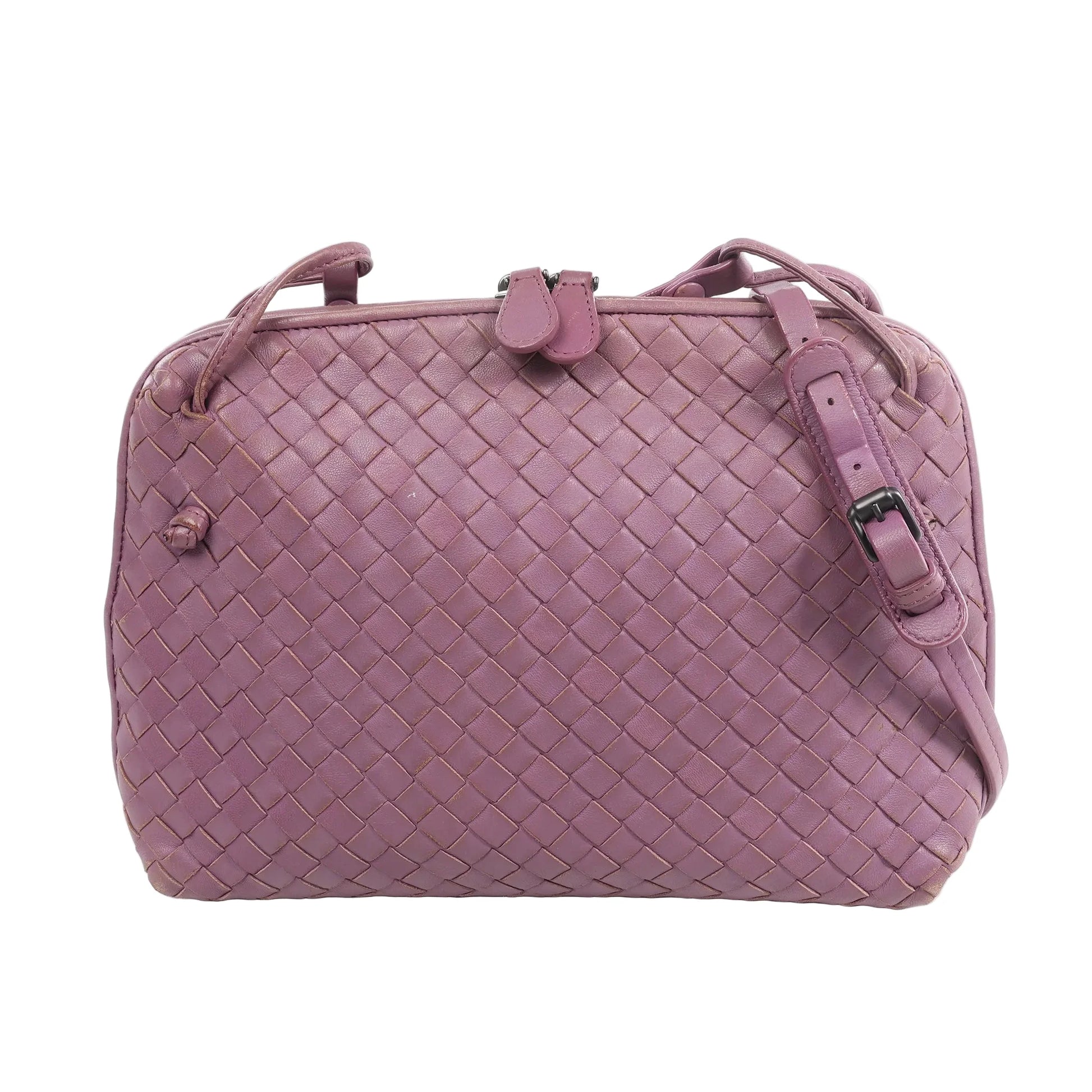 Bottega Veneta Nodini Intrecciato Leather Crossbody Bag in purple lambskin with signature woven pattern, adjustable shoulder strap, and top zip closure, displayed on a white background.