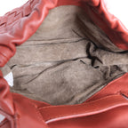 Bolso cruzado Bottega Veneta Cassette Maxi Intrecciato de piel en color beis