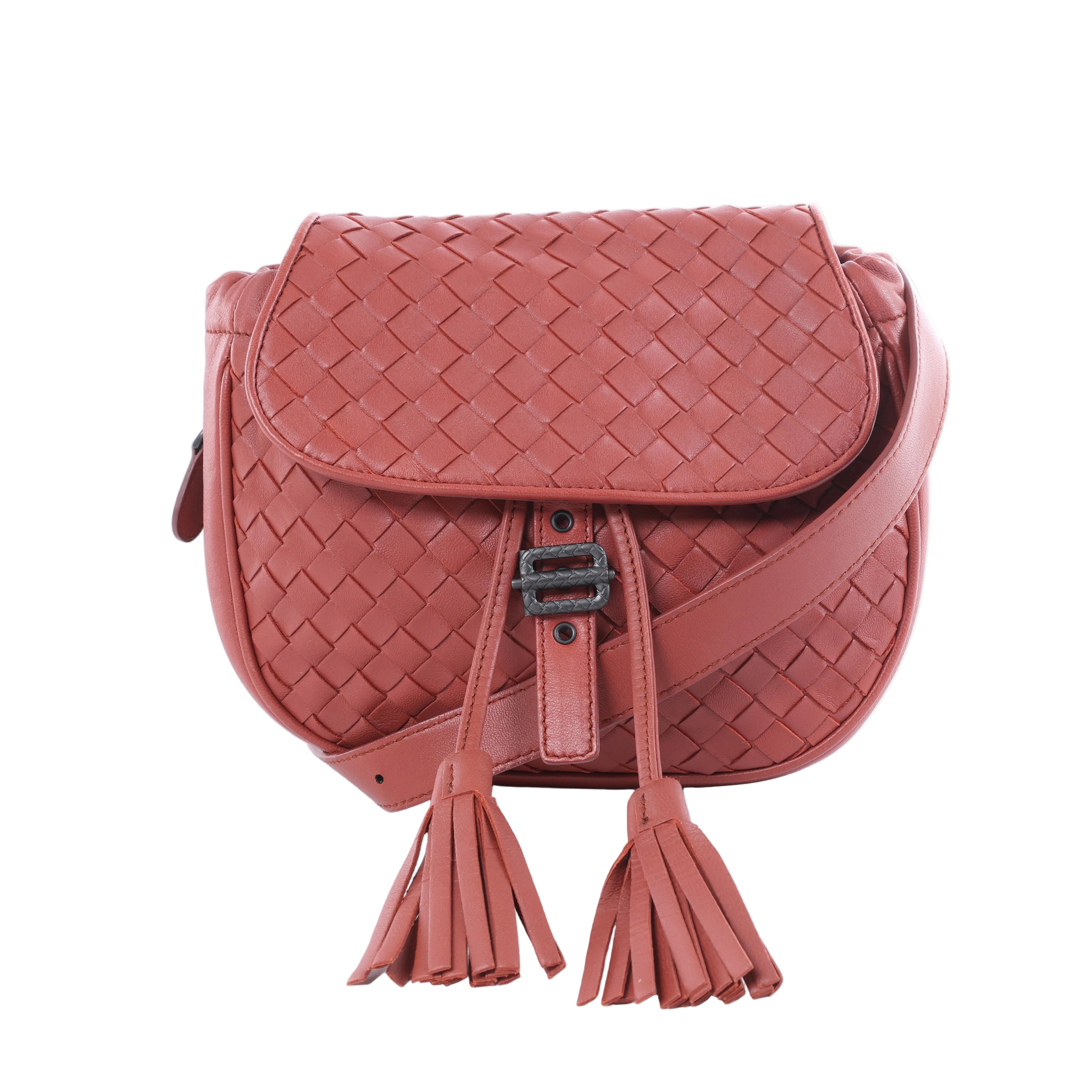 Red Bottega Veneta Intrecciato leather shoulder bag with woven flap, tassel ties, dark-tone clasp and adjustable strap.