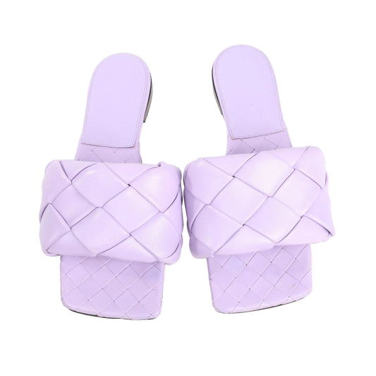 Pair of Bottega Veneta Lido sandals in purple intrecciato leather with square toe design and padded woven straps, shown in size 37 EU.