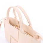 Bottega Veneta The Arco Maxi Intrecciato Leather Handbag in Pink