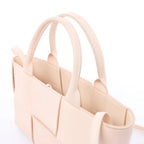 Bottega Veneta The Arco Maxi Intrecciato Leather Handbag in Pink