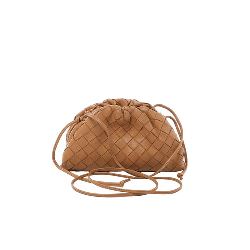 Brown intrecciato woven leather mini pouch bag with gathered drawstring top and slim crossbody strap on white background.