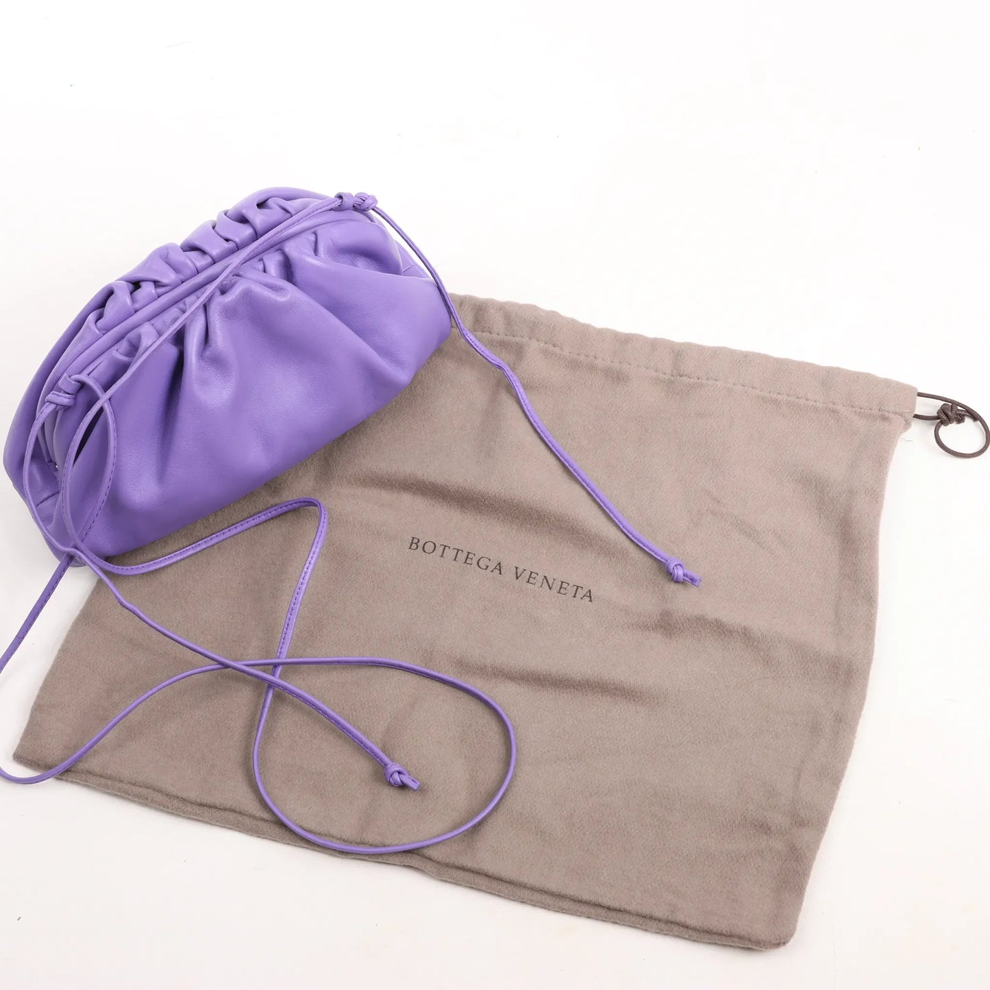Bottega Veneta Mini The Pouch Leather Crossbody bag in Purple