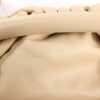 Bottega Veneta Mini The Pouch Leather Crossbody bag in Beige
