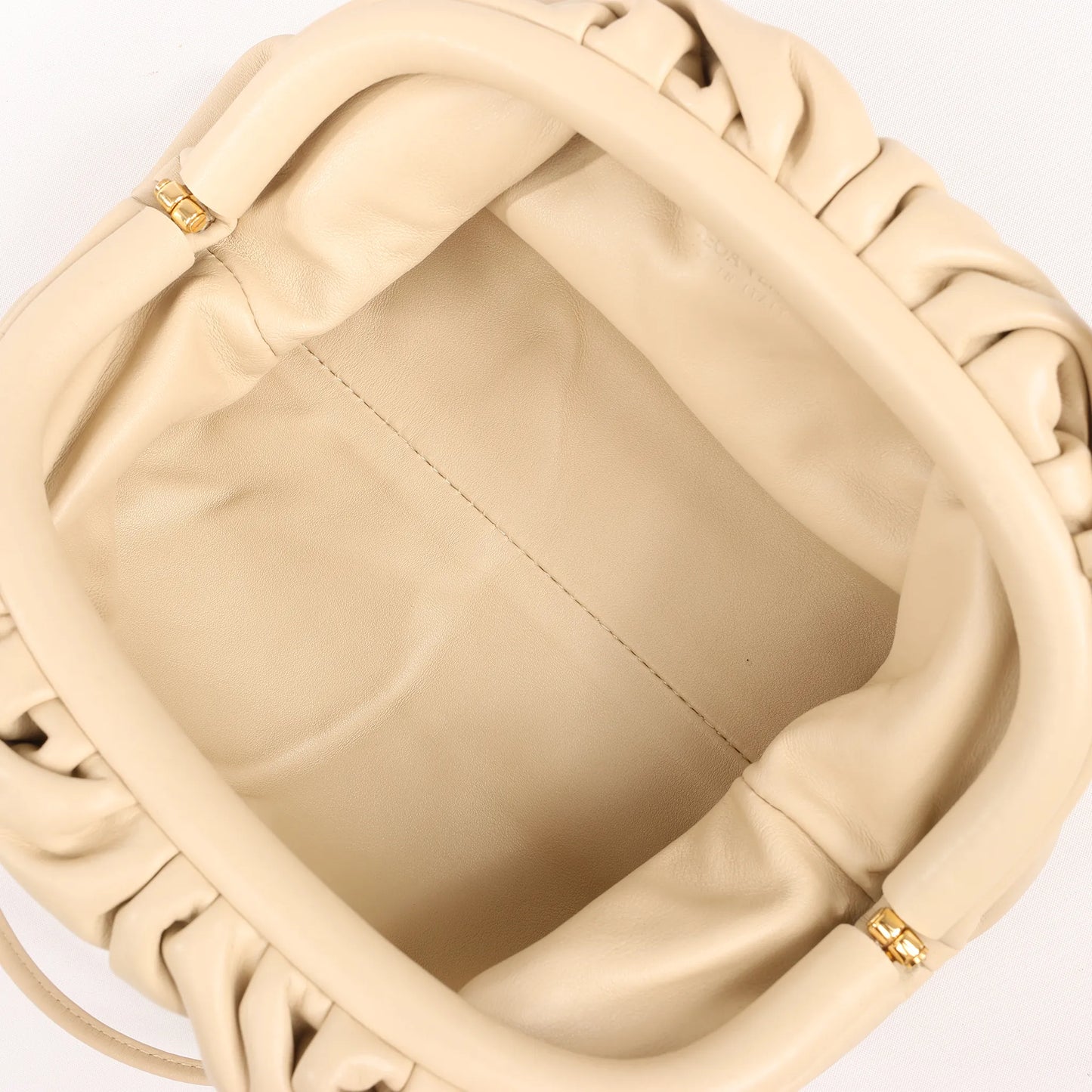 Bottega Veneta Mini The Pouch Leather Crossbody bag in Beige