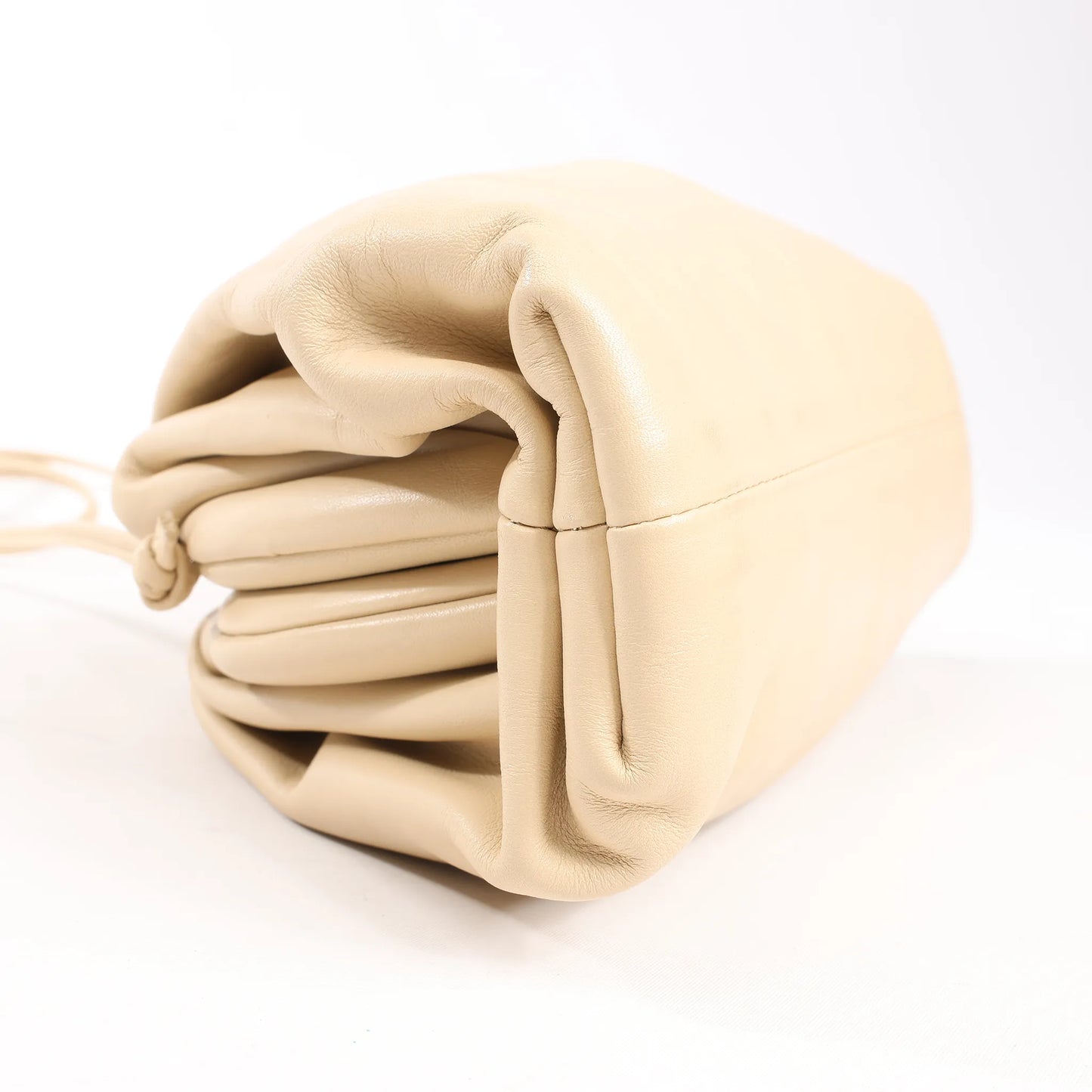 Bottega Veneta Mini The Pouch Leather Crossbody bag in Beige