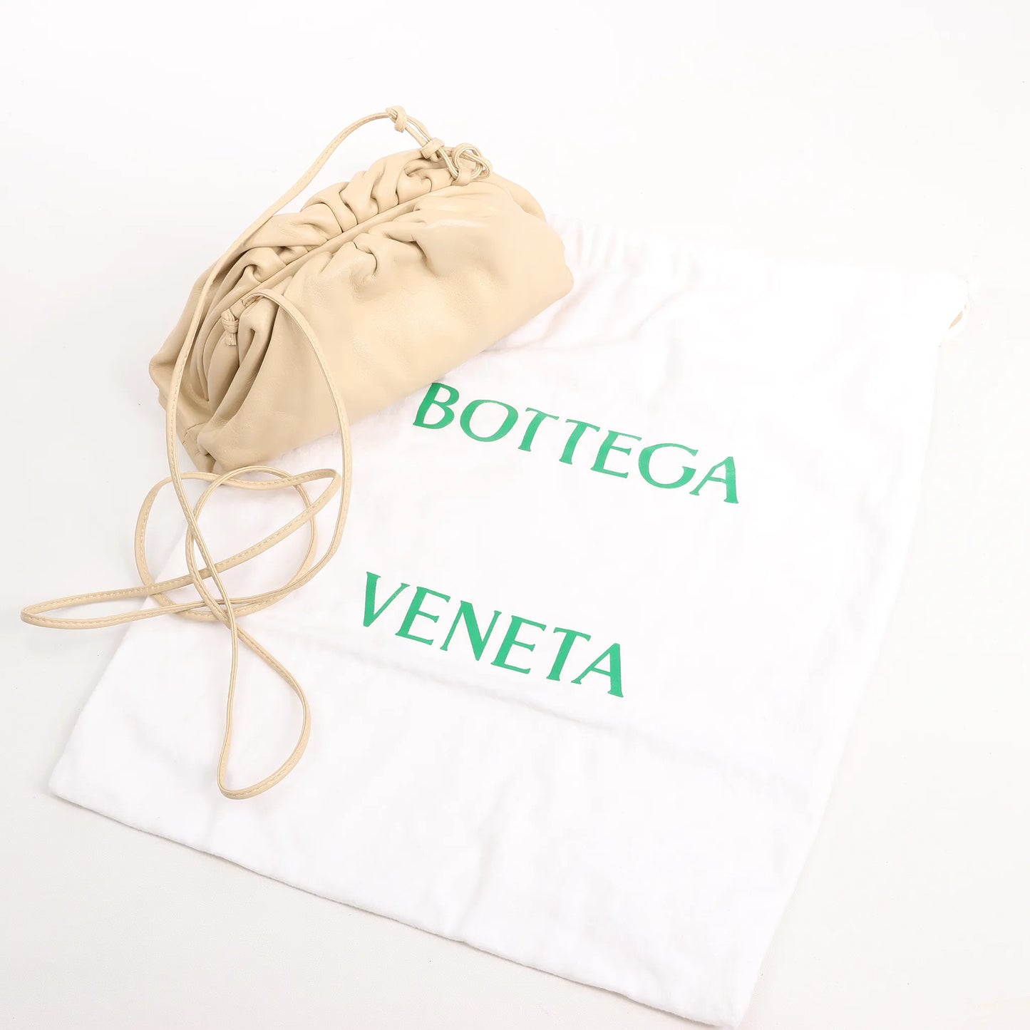 Bottega Veneta Mini The Pouch Leather Crossbody bag in Beige