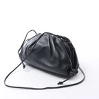 Bottega Veneta The Pouch Mini Leather Crossbody bag in Black