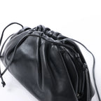 Bottega Veneta The Pouch Mini Leather Crossbody bag in Black