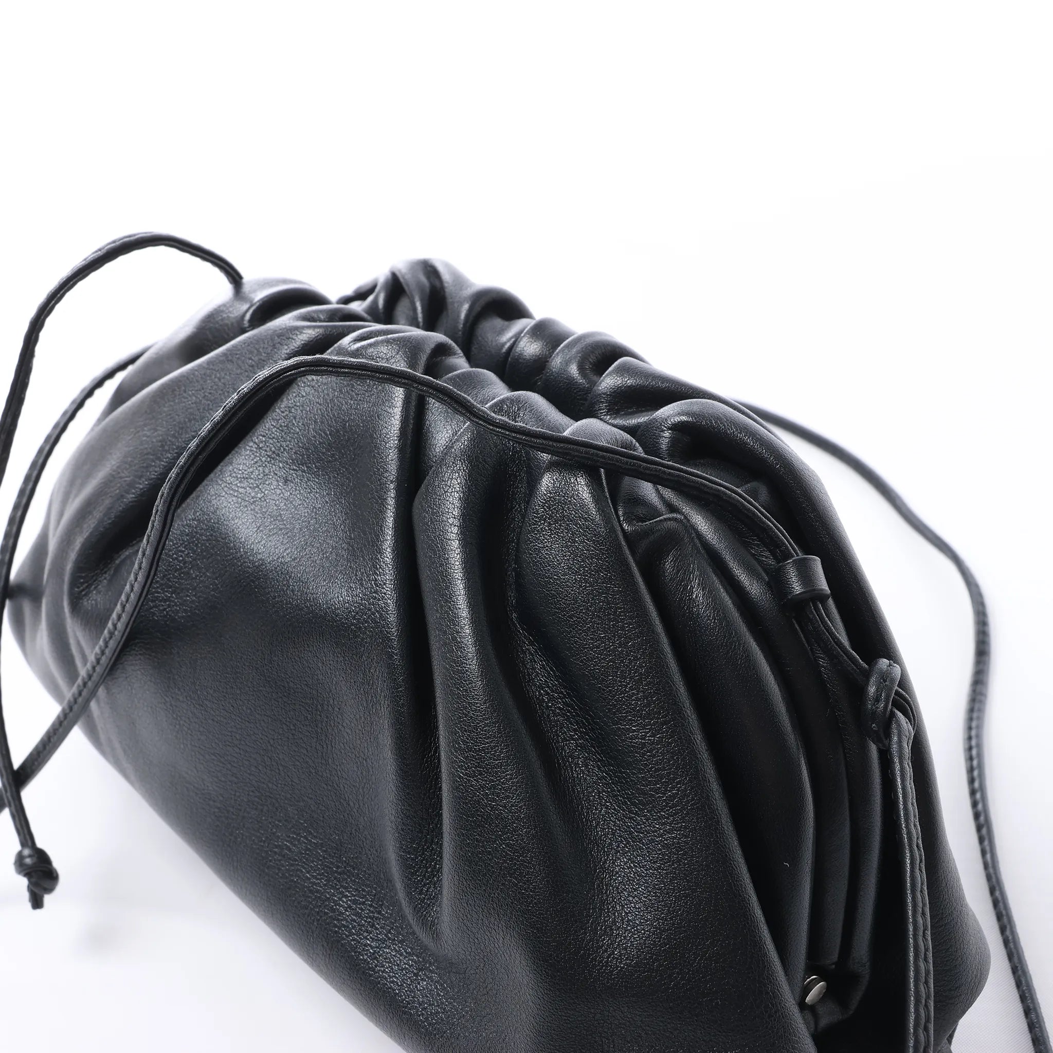 Bottega Veneta The Pouch Mini Leather Crossbody bag in Black