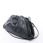 Bottega Veneta The Pouch Mini Leather Crossbody bag in Black