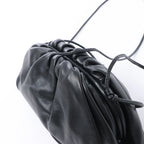 Bottega Veneta The Pouch Mini Leather Crossbody bag in Black