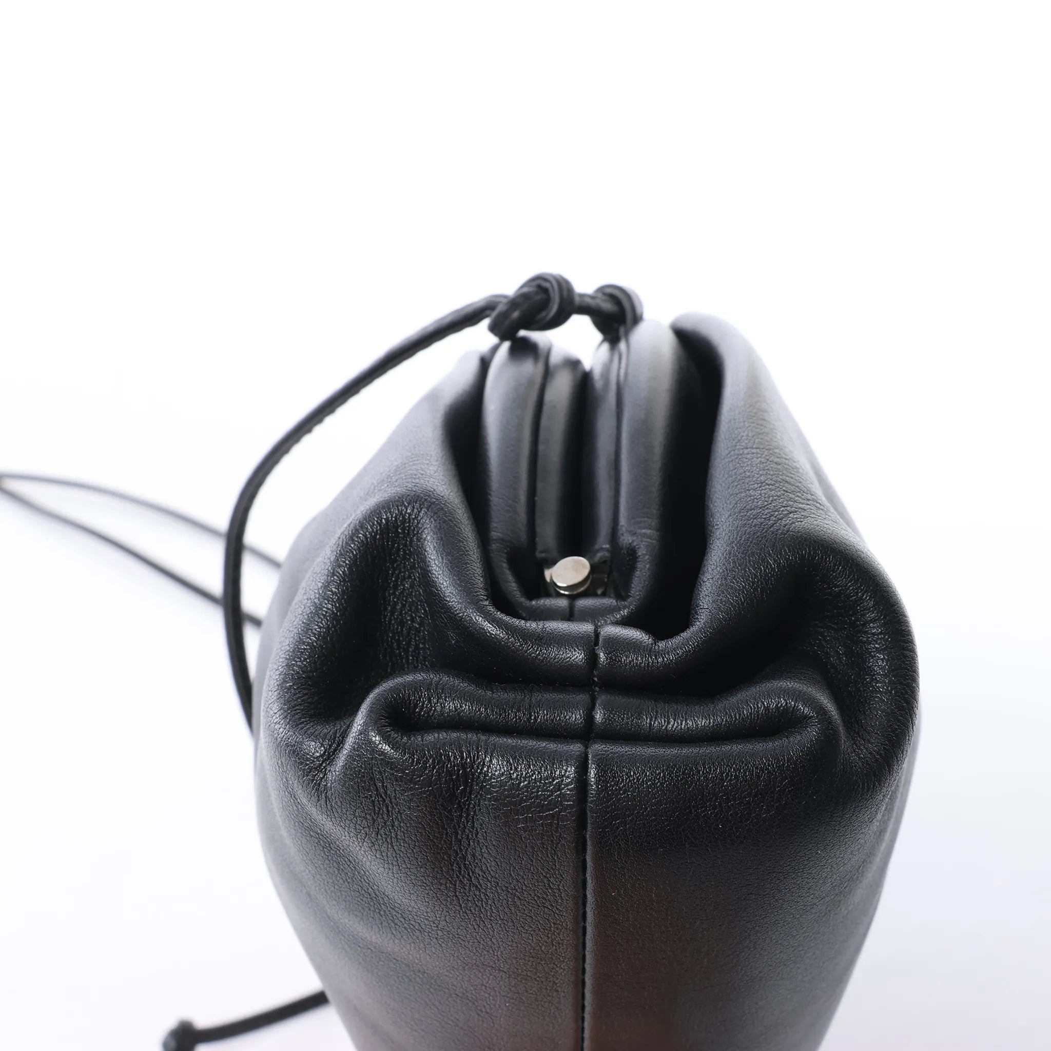 Bottega Veneta The Pouch Mini Leather Crossbody bag in Black
