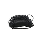 Black Bottega Veneta Mini The Pouch leather crossbody bag with a soft gathered shape and slim leather shoulder strap.