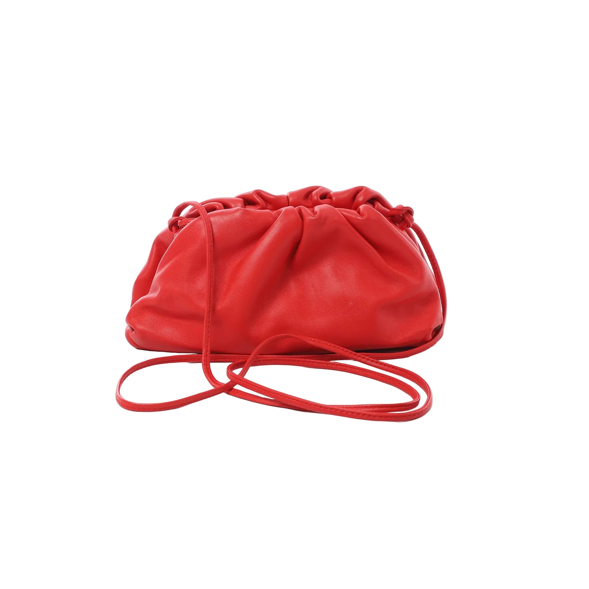Bottega Veneta Mini The Pouch red leather crossbody bag with gathered ruched top and thin strap on white background