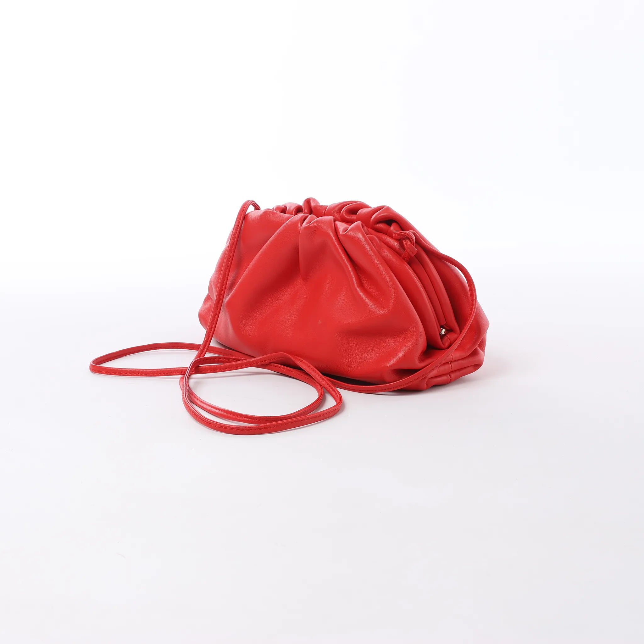 Bottega Veneta Mini The Pouch Leather Crossbody bag in Red