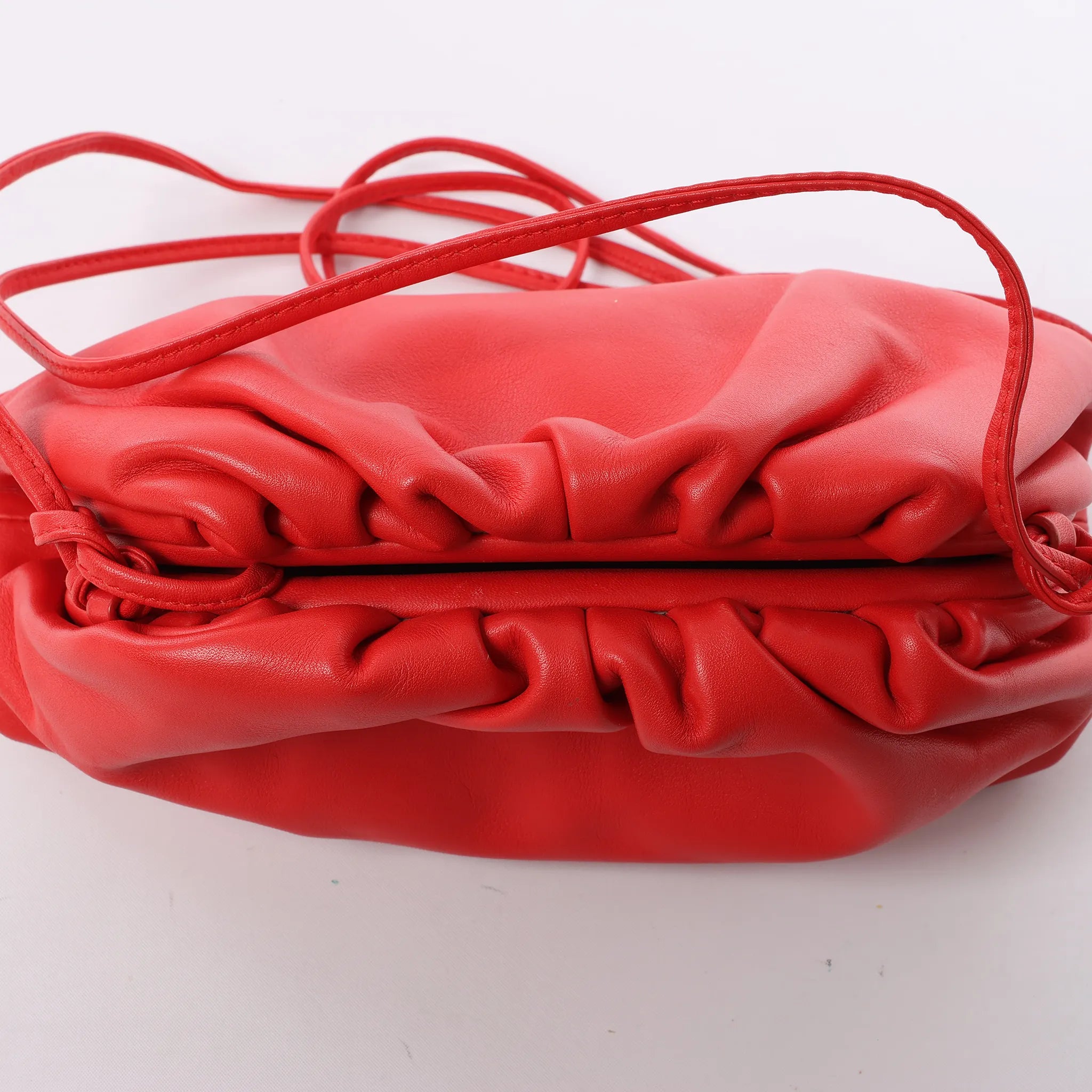 Bottega Veneta Mini The Pouch Leather Crossbody bag in Red