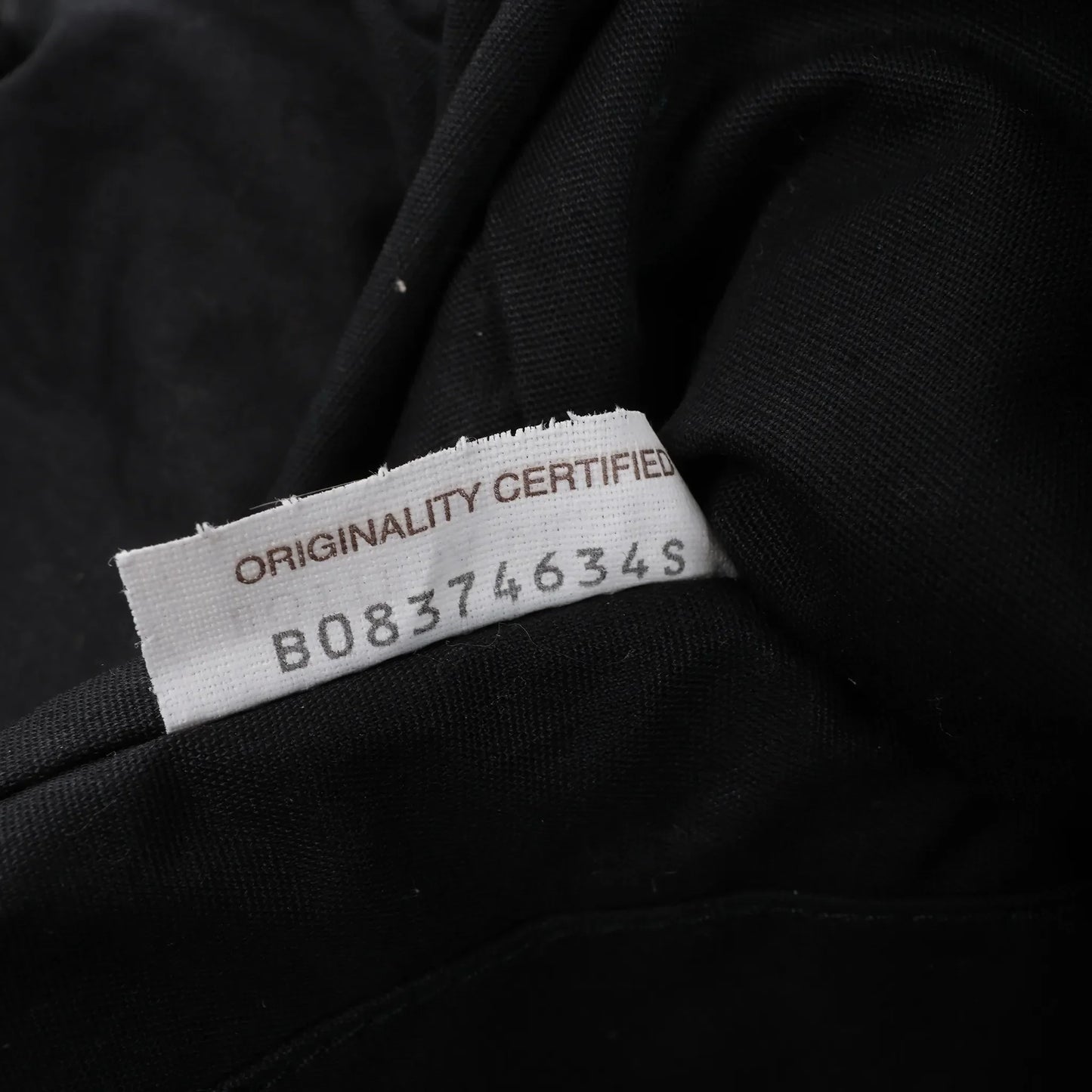 Sac à dos Bottega Veneta en cuir perforé noir