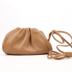 Bottega Veneta Micro The Pouch Leather Crossbody bag in Almond