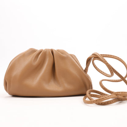 Bottega Veneta Micro The Pouch Leather Crossbody bag in Almond