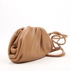 Bottega Veneta Micro The Pouch Leather Crossbody bag in Almond