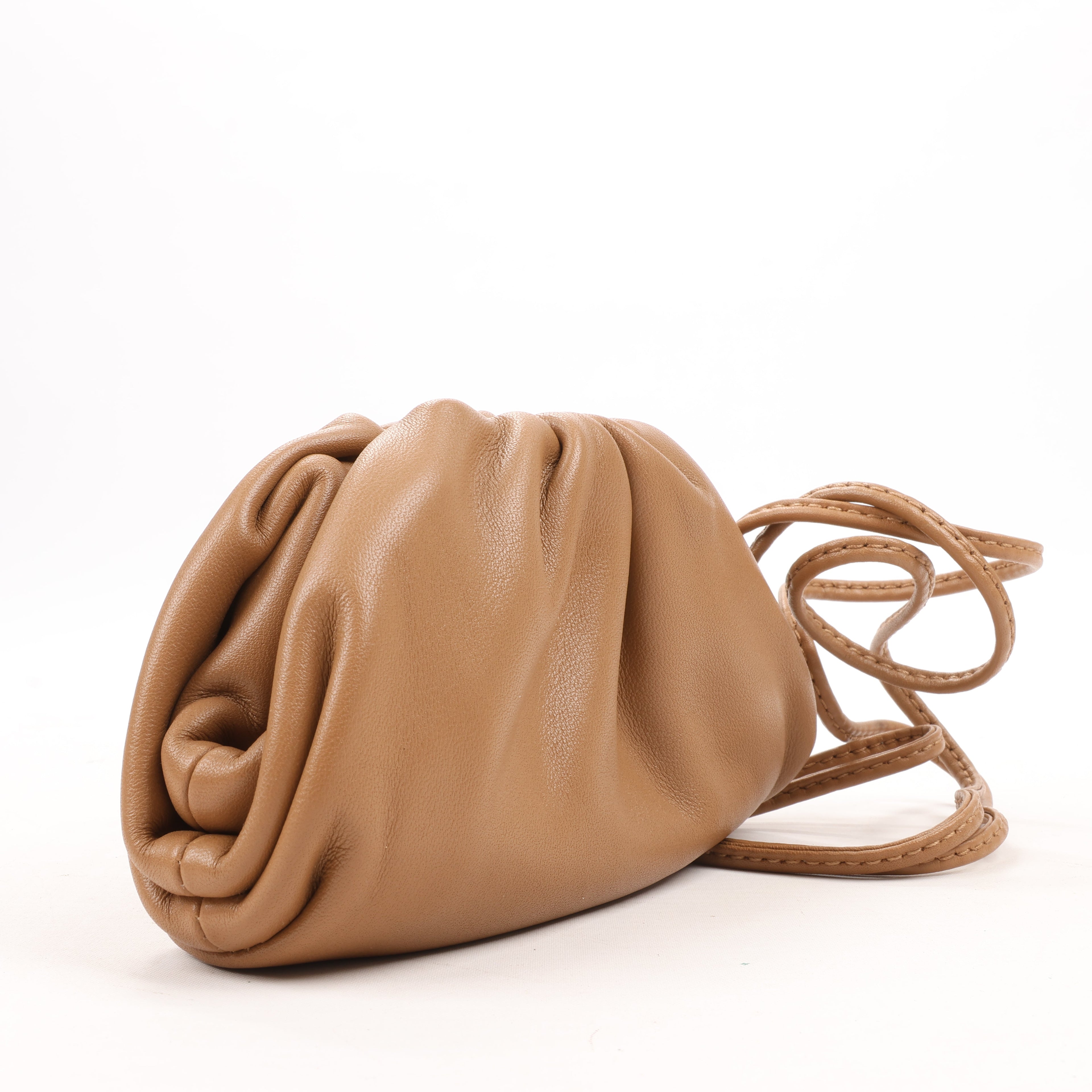 Bottega Veneta Micro The Pouch Leather Crossbody bag in Almond