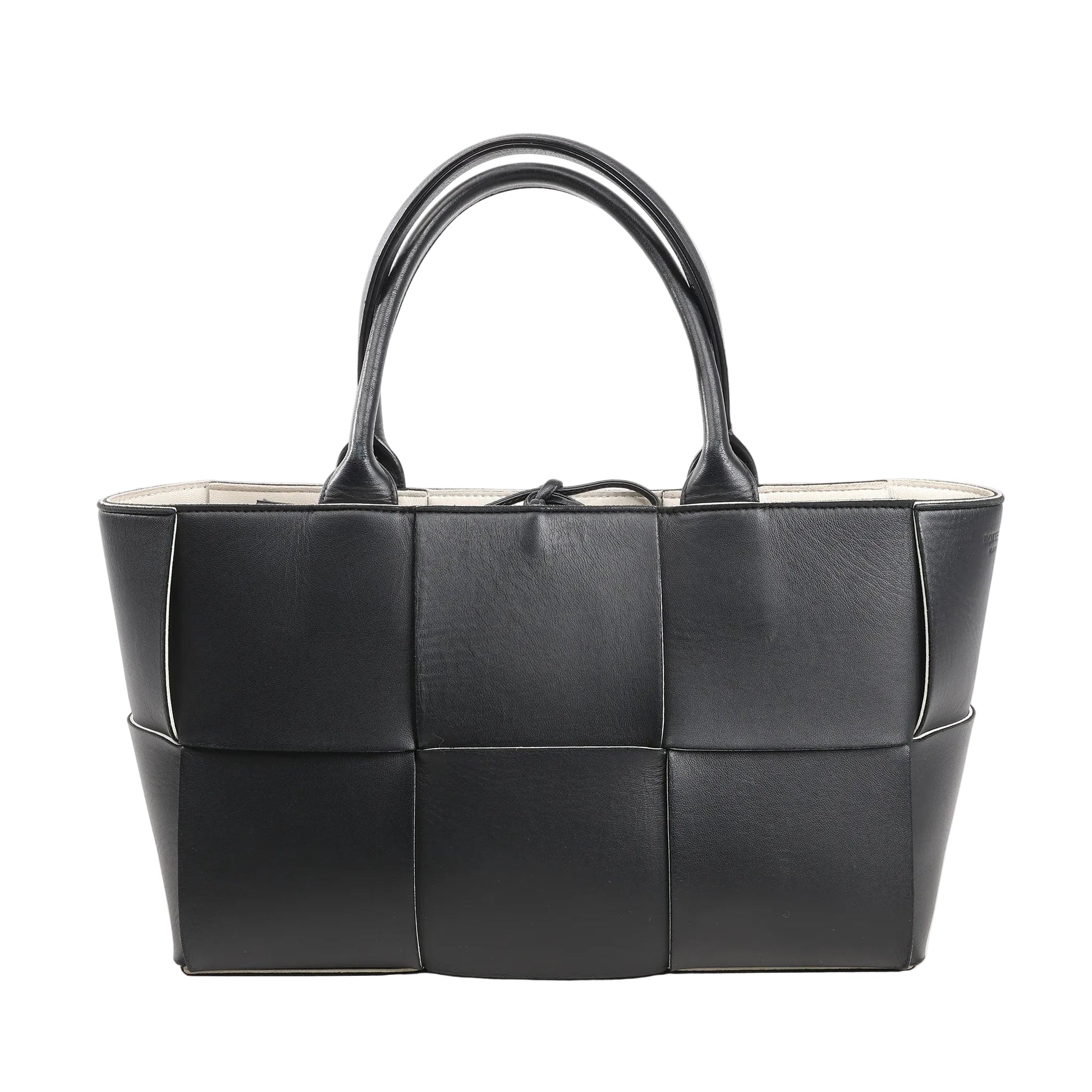 Bottega Veneta The Arco Maxi handbag in black leather with oversized Intrecciato weave, structured silhouette, and double top handles.