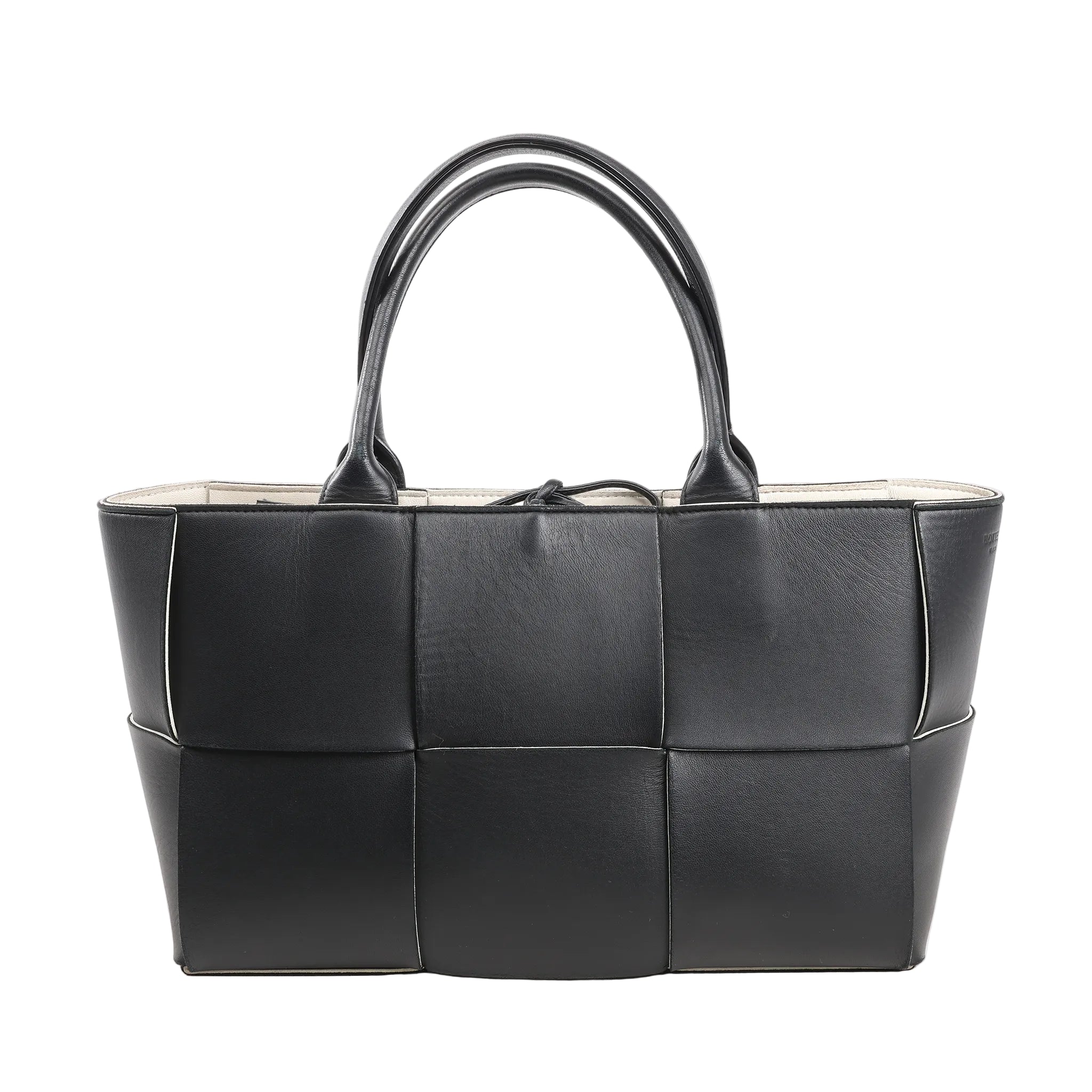 Bottega Veneta The Arco Maxi handbag in black leather with oversized Intrecciato weave, structured silhouette, and double top handles.