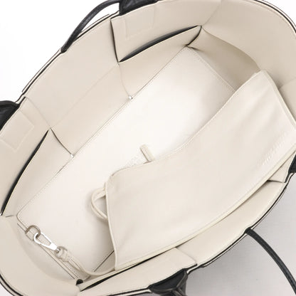 Bottega Veneta The Arco Maxi Intrecciato Leather Handbag in Black