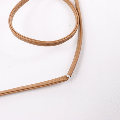 Bottega Veneta Mini The Pouch 20 Cork Crossbody bag in Beige