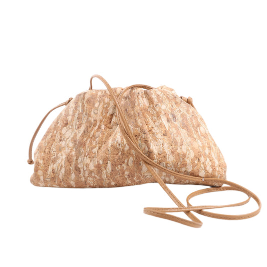 Textured beige handbag with a drawstring on a white background