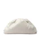 Bottega Veneta The Pouch Oversize clutch in soft beige leather with a voluminous gathered silhouette and concealed top closure.