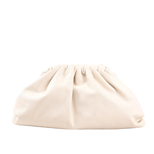 Front view of Bottega Veneta The Pouch oversized clutch bag in beige calfskin leather, featuring a soft, voluminous shape with gathered detailing and a seamless, minimalist design.