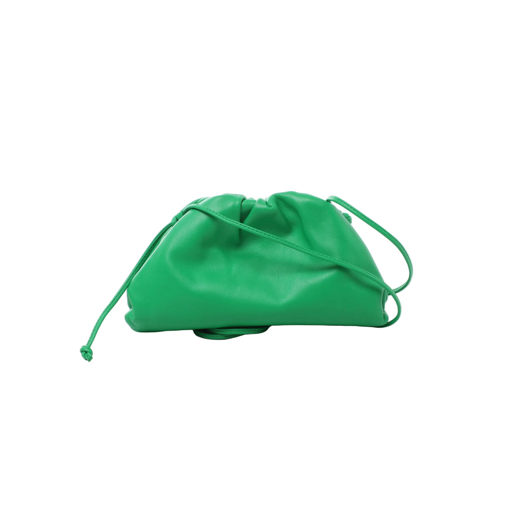 Bottega Veneta The Pouch Mini green leather bag with a softly gathered top and slim matching crossbody strap draped across the front.