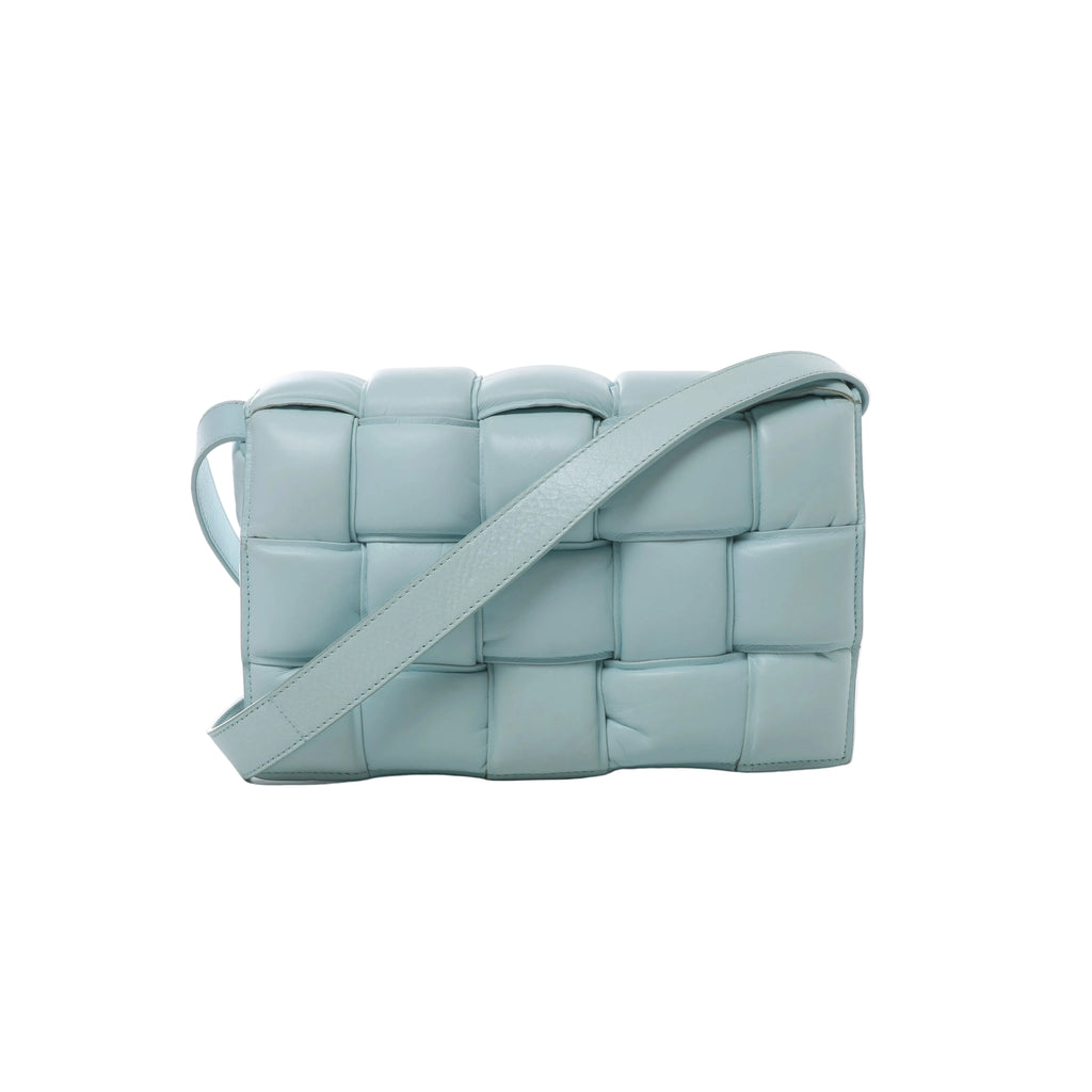 Light blue Bottega Veneta Padded Cassette crossbody bag with oversized padded Intrecciato leather weaving and a wide matching shoulder strap.