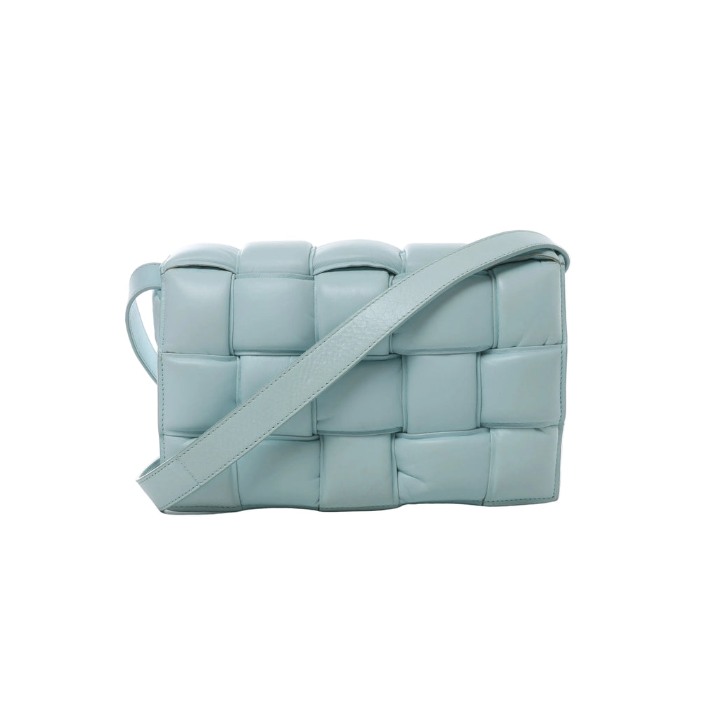 Light blue Bottega Veneta Padded Cassette crossbody bag with oversized padded Intrecciato leather weaving and a wide matching shoulder strap.