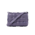 Purple Bottega Veneta Padded Cassette crossbody bag with oversized padded Intrecciato leather weaving and a wide matching shoulder strap.