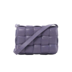 Purple Bottega Veneta Padded Cassette crossbody bag with oversized padded Intrecciato leather weaving and a wide matching shoulder strap.