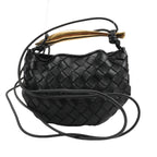 Bottega Veneta Intrecciato Sardines Leather Shoulder Bag in black with a gold-tone handle and adjustable straps, showcasing the woven leather design.