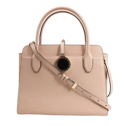 BVLGARI ALBA 2-way handbag in beige grained leather featuring top handles, detachable shoulder strap, structured shape, and gold-tone circular logo charm with black enamel center.