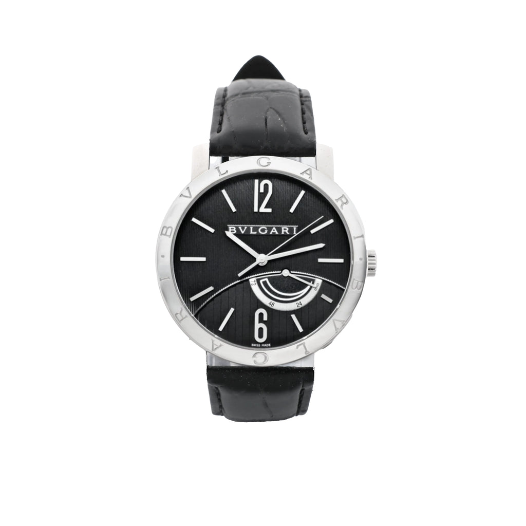 Bvlgari Bvlgari watch with a black textured dial, silver-tone hands and markers, power reserve display, engraved bezel and black leather strap.
